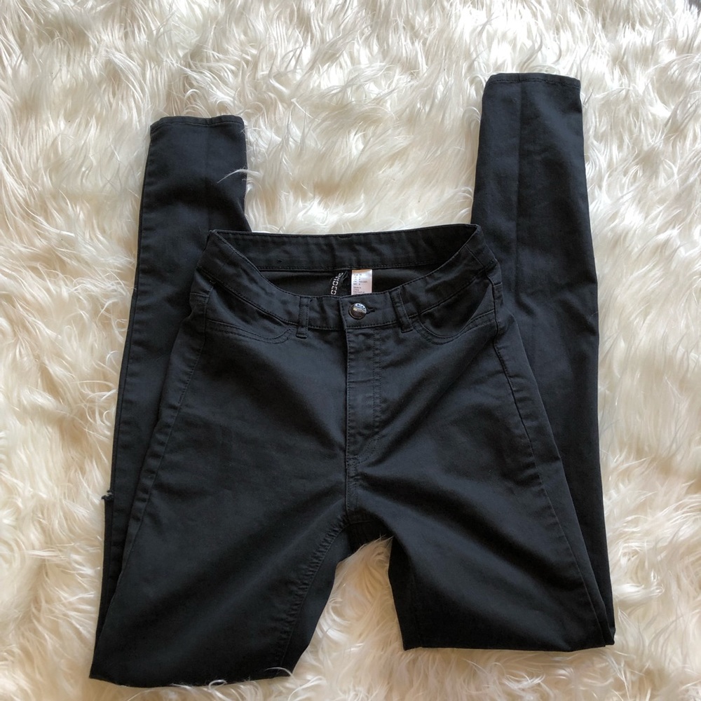 Black high waisted skinny jeans with holes